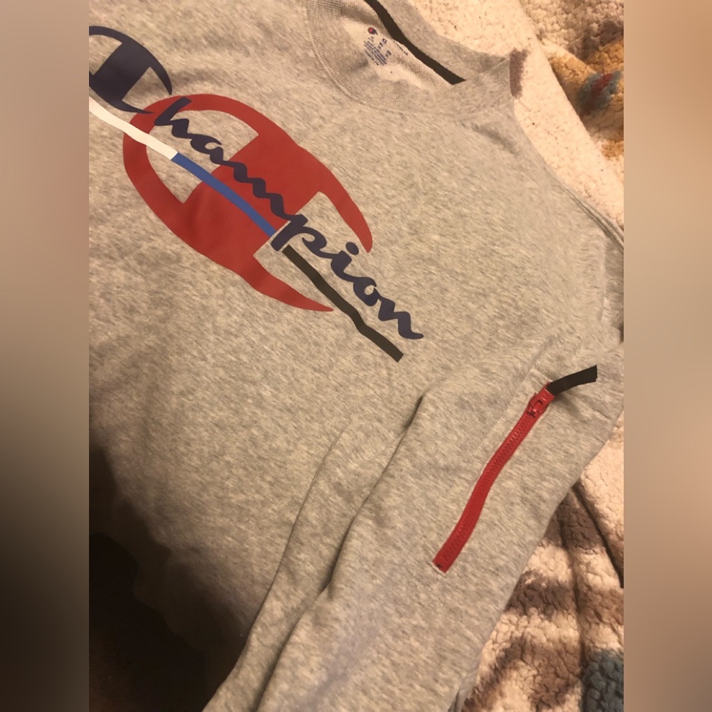 Champion sweatshirt. Long sleeves. Zipper on sleeve. Hard to find style.